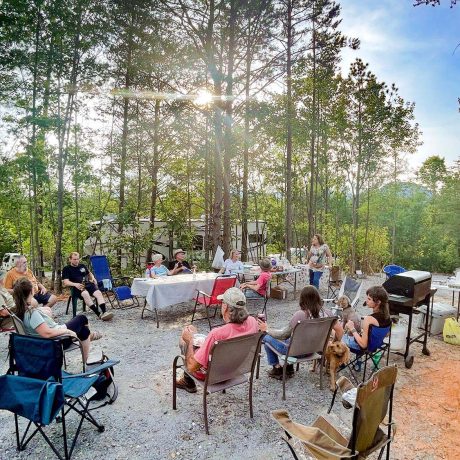 people eating at their campsite